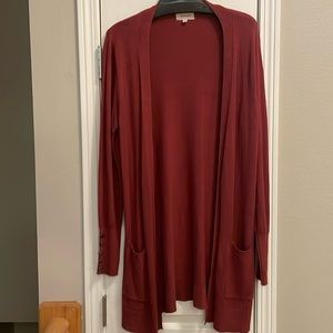 Becaal Cardigan. Mid length. Size L. Color: Wine